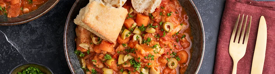 Spaanse tomatenstoof met bonen, wortel en witvis