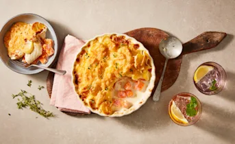 Aardappel pompoengratin met kabeljauw