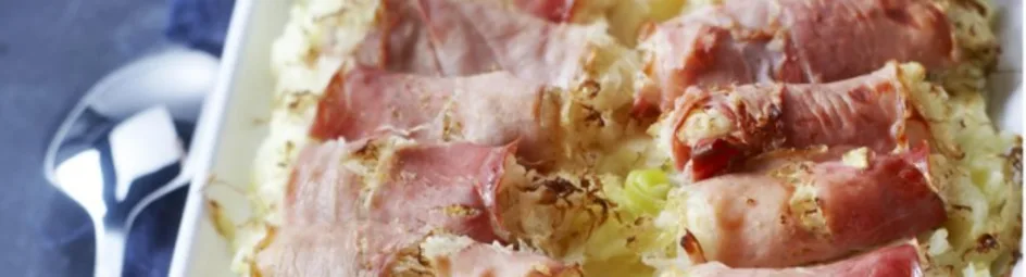 Zuurkoolrolletjes met rauwe ham uit de oven