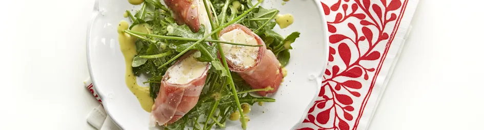 Rucolasalade met hamrolletjes