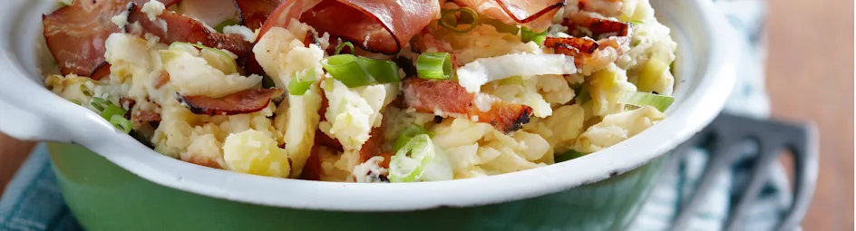 Witlofstamppot met katenspek en bosui