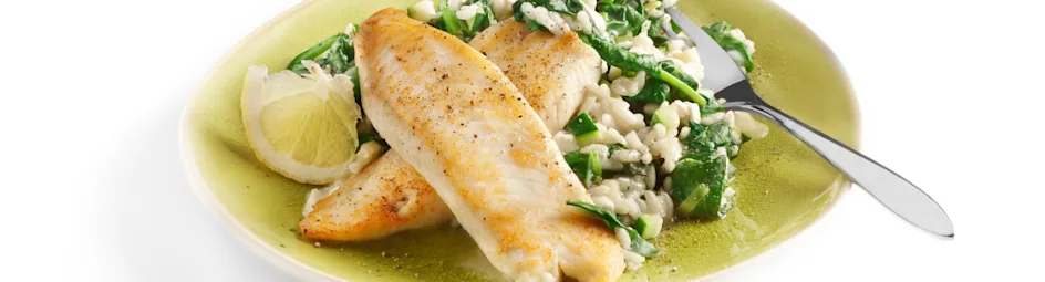Tilapia met spinazie- risotto en geitenkaas