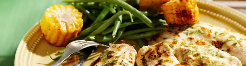 Gegratineerde tilapia met pikante saus