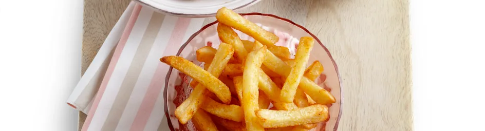 Sweet chili kippenvleugeltjes met ovenfriet