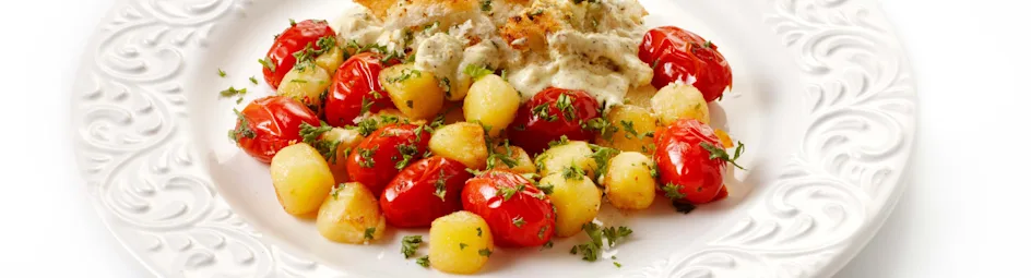 Gegratineerde kabeljauw met krieltjes en kerstomaatjes