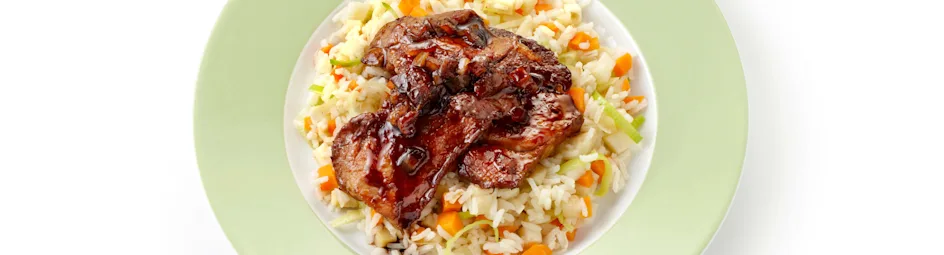 Geroosterde varkenslapjes met winterpilav