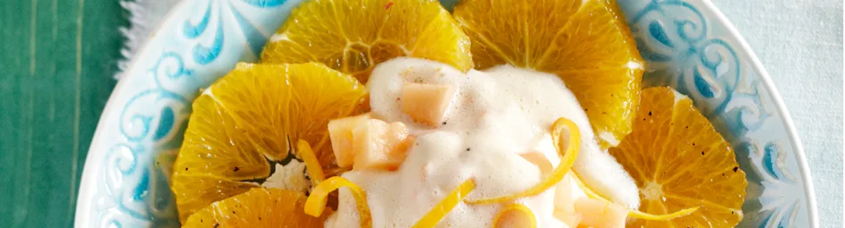 Sinaasappelcarpaccio met meloen en proseccosabayon