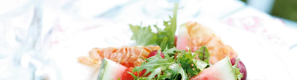 Salade van watermeloen, druiven en parmaham