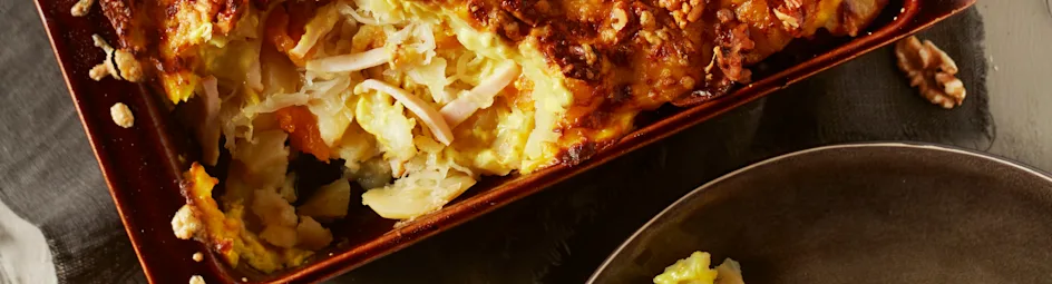 Zuurkoolschotel met kip, kaas en abrikozen