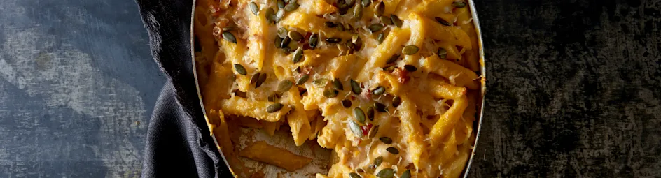 Penne met romige pompoensaus en spekjes