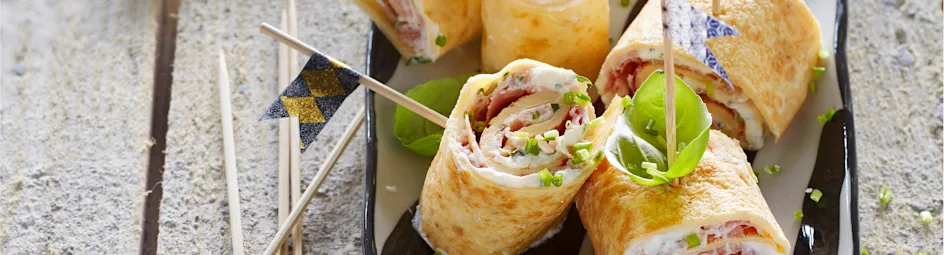 Omeletrolletjes met rauwe ham en kruidenricotta