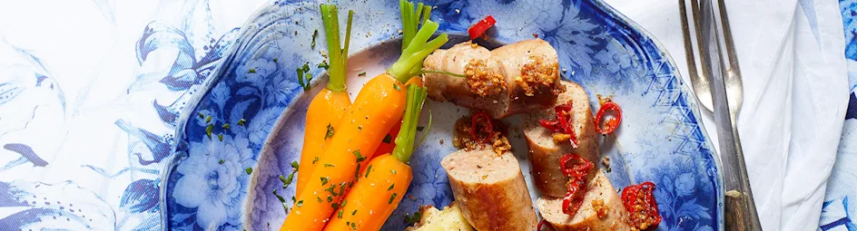 Aardappelgratin met saucijzen, wortel en pittige jus