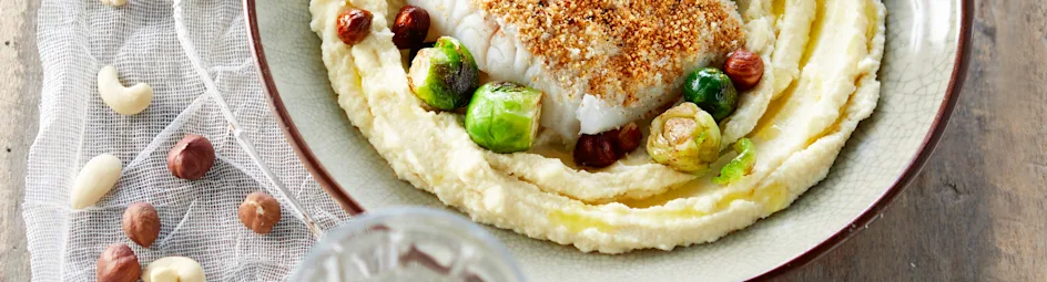 Kabeljauw met amandelkorst en bloemkool-cashewnotenpuree