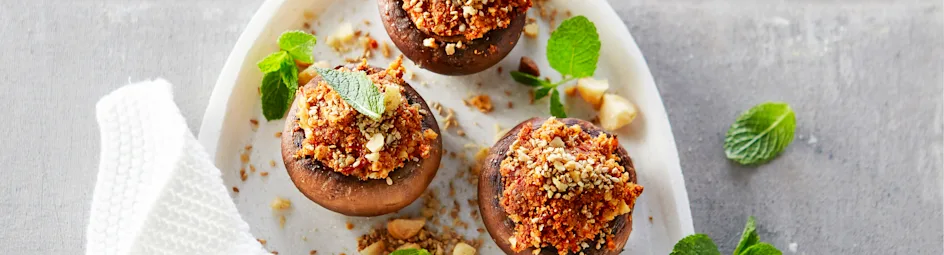 Gevulde kastanjechampignons met walnoten en macadamia