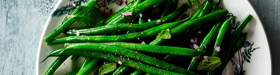 Sperziebonen met vinaigrette en munt