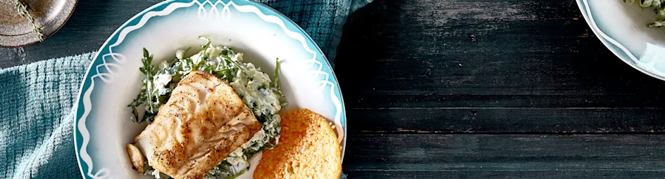 Bloemkool-rucolastamppot met kabeljauw en kaaskrokantje