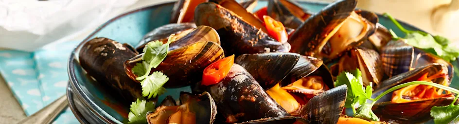 Mosselpakketjes met curry en kokos