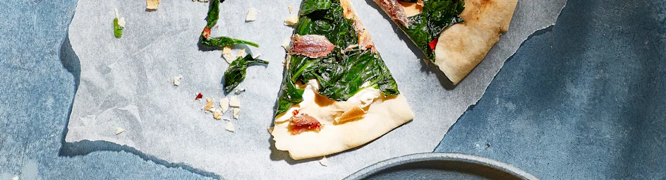 Snelle pizza met ricotta, spinazie en ansjovis