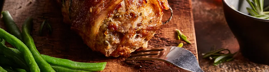 Varkensrollade met spek en appelglazing