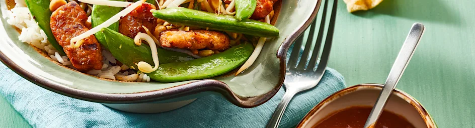 Gewokte sugarsnaps met pinda's