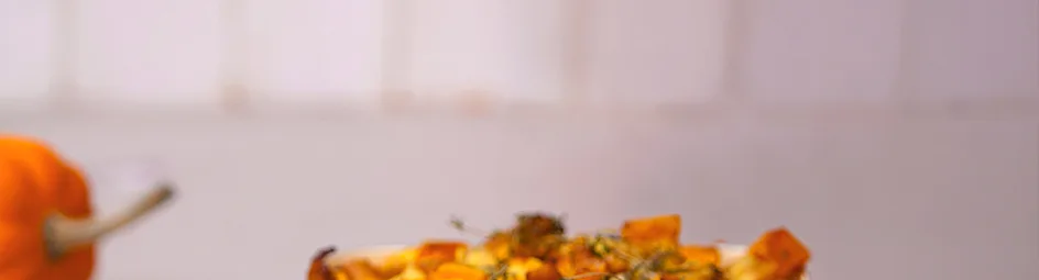 Aardappelschotel met kip, pompoen en wortel