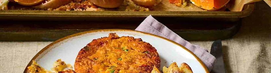 Geroosterde pompoen met kaas en kruiden