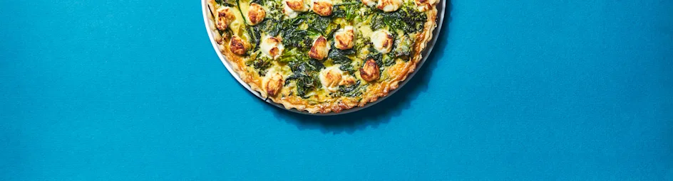 Groene groentequiche met geitenkaas