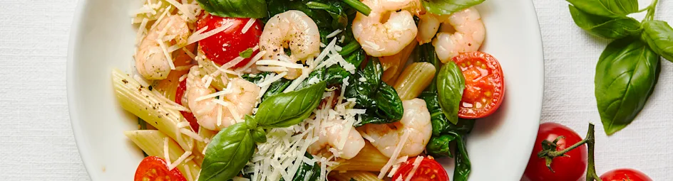 Penne met garnalen, tomaatjes en spinazie