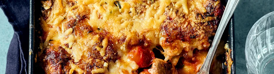 Gnocchi-gratin met kastanjechampignons en tomaatjes