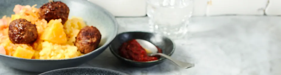 Zuurkool met aardappelpuree en pikante gehaktballetjes