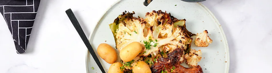 Bloemkool uit de oven met krieltjes en karbonade