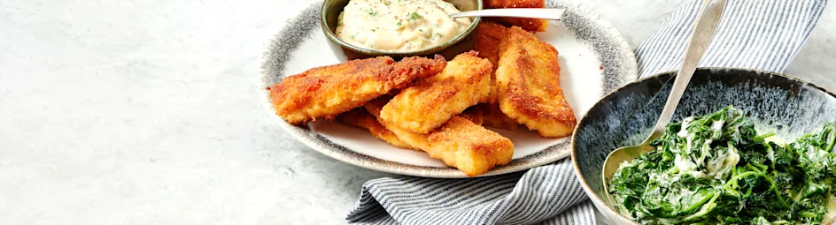 Zelfgemaakte vissticks met rösti en spinazie à la crème