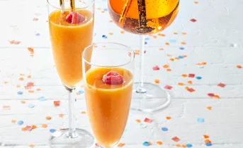 Mango mocktail met framboos