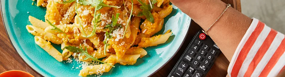 Penne met pompoenpesto en rucola