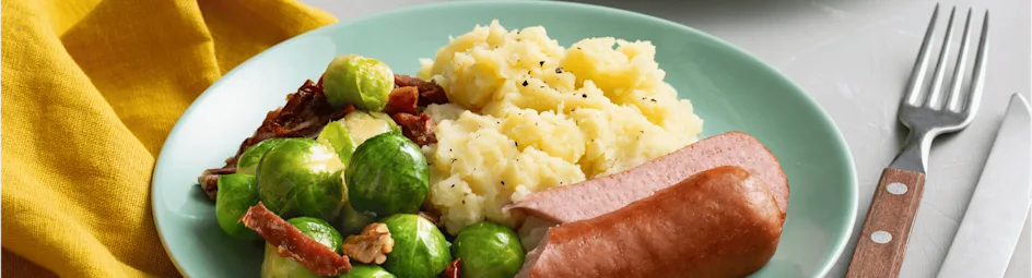 Aardappelpuree met spruitjes en magere rookworst