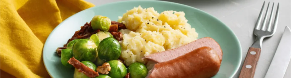 Aardappelpuree met spruitjes en magere rookworst