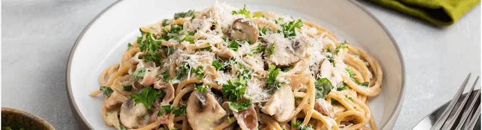 Spaghetti carbonara met champignons en boerenkool