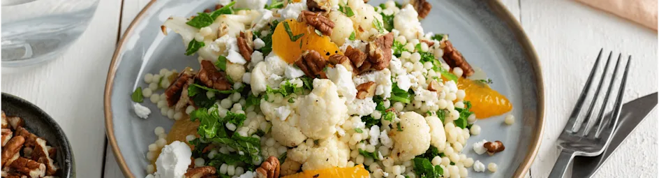 Parelcouscous met bloemkool, mineola en geitenkaas