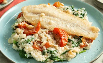 Risotto met spinazie en gebakken victoriabaars