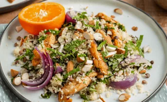 Couscous met boerenkool, linzen en kruidige kip