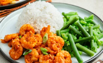 Pittige garnalen met groene bonen