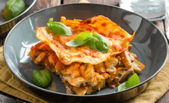 Romige lasagne met kip en champignons