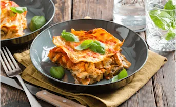 Romige lasagne met kip en champignons