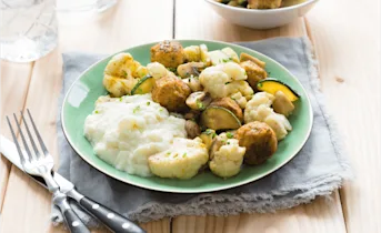 Bloemkoolpuree met champignons en vega balletjes