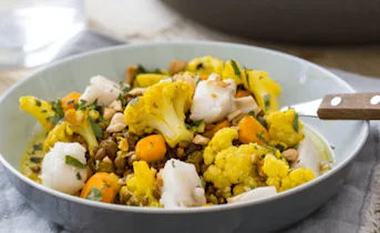 Bloemkoolcurry met linzen en kabeljauw