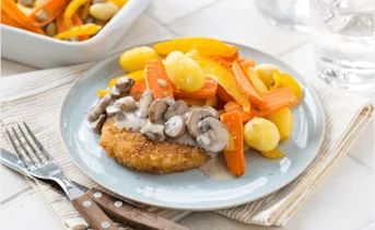 Vegetarische schnitzels met champignon-roomsaus
