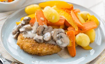 Vegetarische schnitzels met champignon-roomsaus