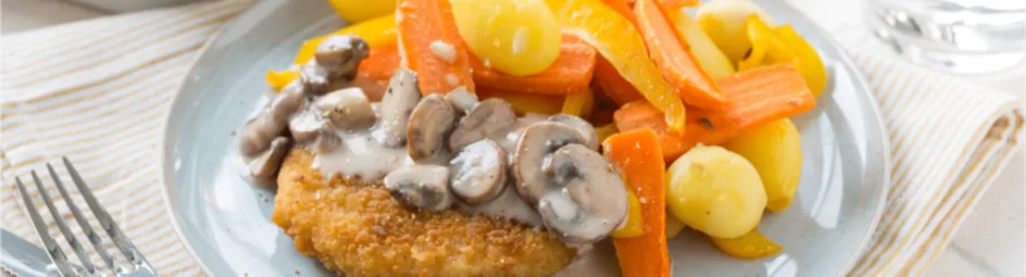 Vegetarische schnitzels met champignon-roomsaus