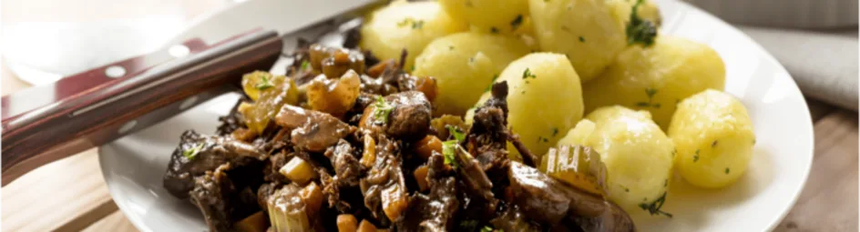 Sukadelappen uit de oven met rode wijnsaus