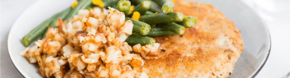 Wienerschnitzels met rösti en sinaasappelboontjes